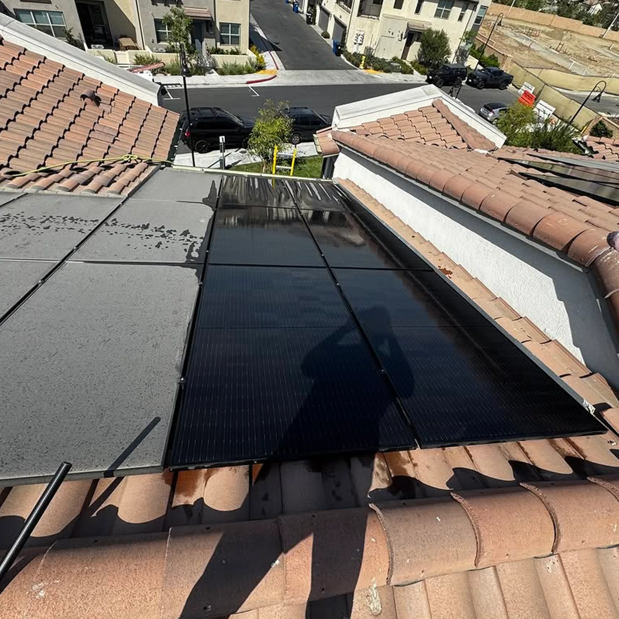 rooftop solar panels with pollen debris